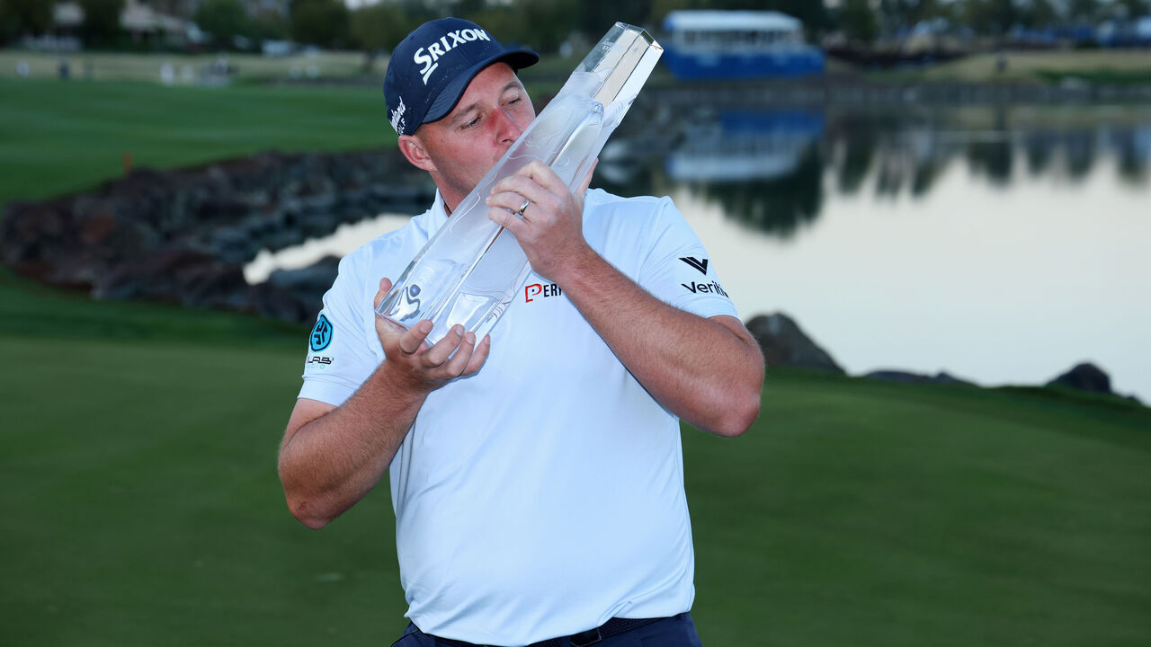LA QUINTA, CALIFORNIA - JANUARY 19: Sepp Straka of Austria poses with the trophy after putting in to win on the 18th green during the final round of The American Express 2025 at Pete Dye Stadium Course on January 19, 2025 in La Quinta, California.