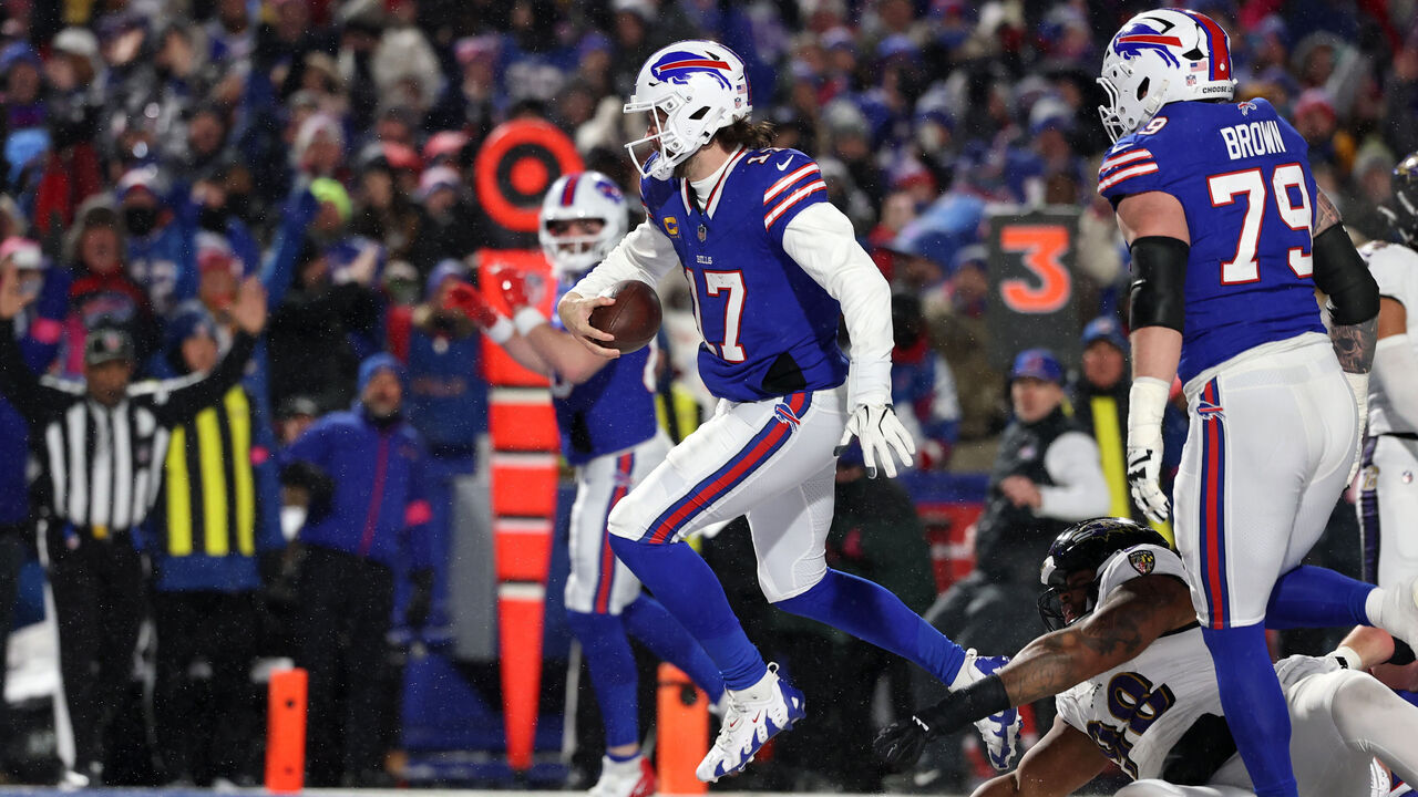 ORCHARD PARK, NEW YORK - JANUARY 19: Josh Allen #17 of the Buffalo Bills scores a touchdown against the Baltimore Ravens in the second quarter during the AFC Divisional Playoff at Highmark Stadium on January 19, 2025 in Orchard Park, New York.