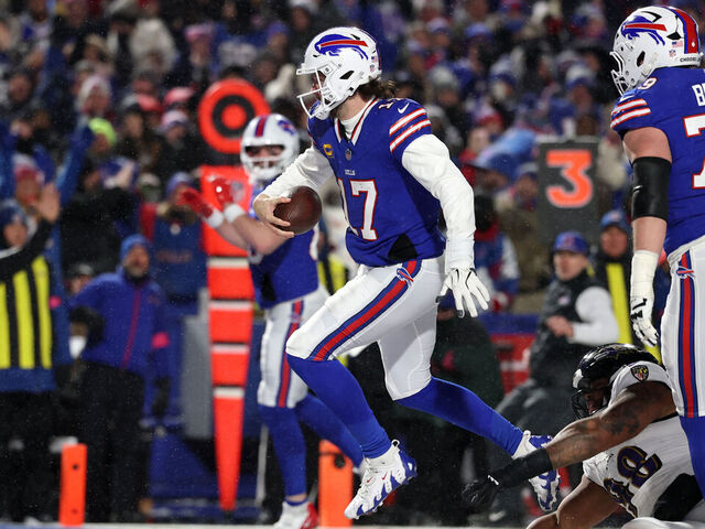 ORCHARD PARK, NEW YORK - JANUARY 19: Josh Allen #17 of the Buffalo Bills scores a touchdown against the Baltimore Ravens in the second quarter during the AFC Divisional Playoff at Highmark Stadium on January 19, 2025 in Orchard Park, New York.