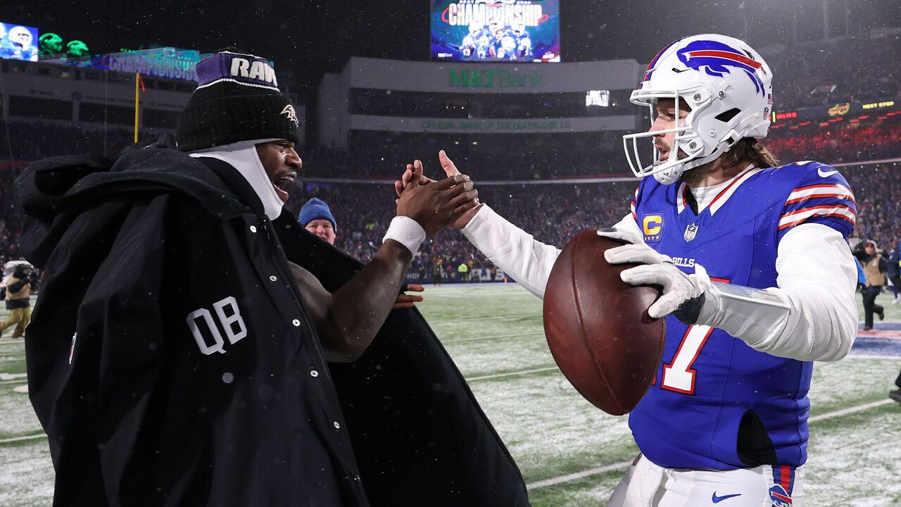 ORCHARD PARK, NEW YORK - JANUARY 19: Lamar Jackson #8 of the Baltimore Ravens and Josh Allen #17 of the Buffalo Bills embrace after the AFC Divisional Playoff game at Highmark Stadium on January 19, 2025 in Orchard Park, New York.