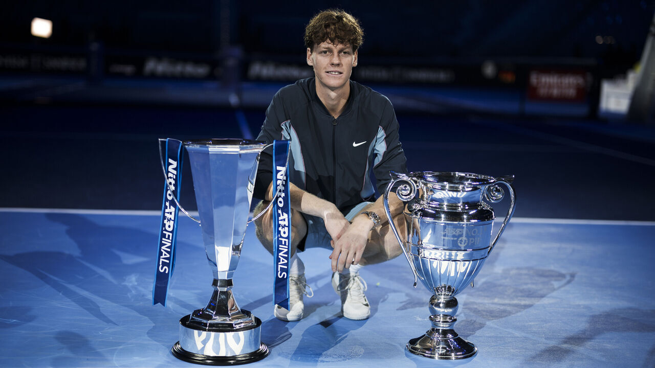 INALPI ARENA, TURIN, ITALY - 2024/11/17: Jannik Sinner of Italy poses with the ATP Finals singles trophy and the year-end ATP No. 1 trophy at the end of his final singles match against Taylor Fritz of USA during day eight of the Nitto ATP Finals. Jannik Sinner won the match 6-4, 6-4.