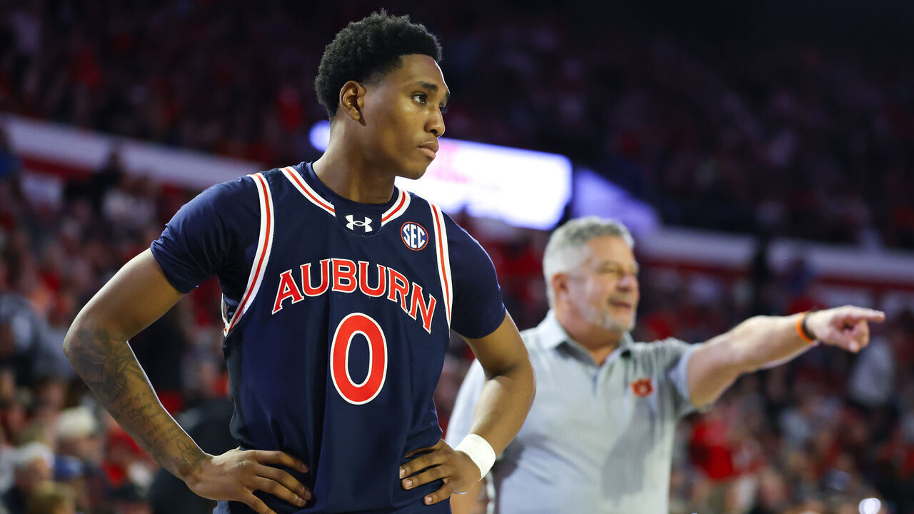 ATHENS, GEORGIA - JANUARY 18: Tahaad Pettiford #0 of the Auburn Tigers looks on as head coach Bruce Pearl reacts during the second half against the Georgia Bulldogs at Stegeman Coliseum on January 18, 2025 in Athens, Georgia.