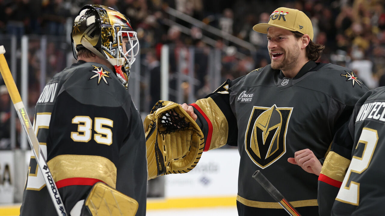 LAS VEGAS, NEVADA - JANUARY 02: Ilya Samsonov #35 of the Vegas Golden Knights celebrates with Adin Hill #33 after a victory against the Philadelphia Flyers at T-Mobile Arena on January 02, 2025 in Las Vegas, Nevada.
