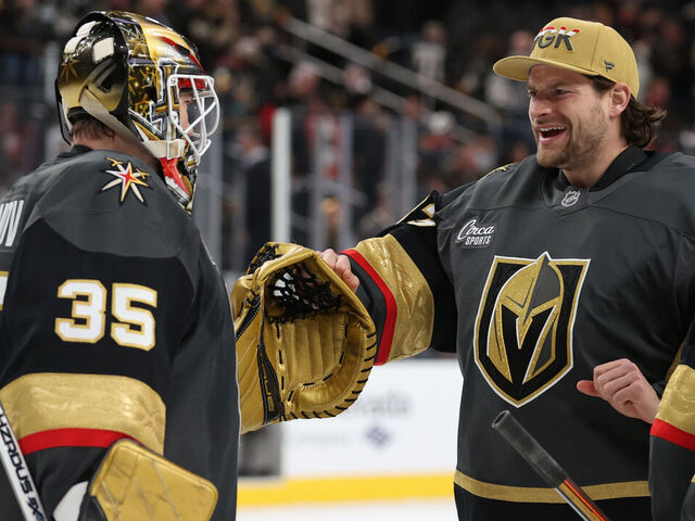 LAS VEGAS, NEVADA - JANUARY 02: Ilya Samsonov #35 of the Vegas Golden Knights celebrates with Adin Hill #33 after a victory against the Philadelphia Flyers at T-Mobile Arena on January 02, 2025 in Las Vegas, Nevada.
