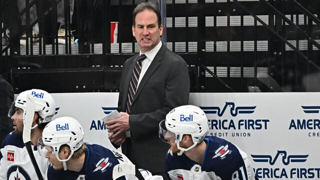 SALT LAKE CITY, UTAH - JANUARY 20: Head Coach Scott Arniel of the Winnipeg Jets talks to his team on the bench during the second period against the Utah Hockey Club on January 20, 2025 at Delta Center in Salt Lake City, Utah.