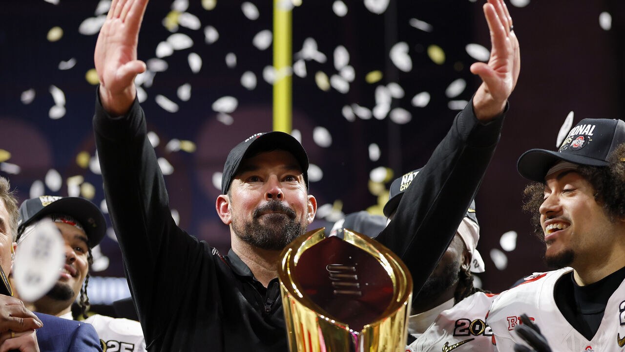 ATLANTA, GEORGIA - JANUARY 20: Head coach Ryan Day and the Ohio State Buckeyes celebrate after beating the Notre Dame Fighting Irish 34-23 in the 2025 CFP National Championship at the Mercedes-Benz Stadium on January 20, 2025 in Atlanta, Georgia.