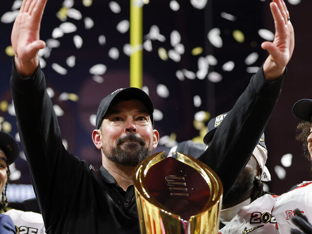 ATLANTA, GEORGIA - JANUARY 20: Head coach Ryan Day and the Ohio State Buckeyes celebrate after beating the Notre Dame Fighting Irish 34-23 in the 2025 CFP National Championship at the Mercedes-Benz Stadium on January 20, 2025 in Atlanta, Georgia.