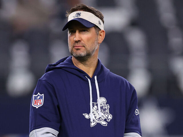 ARLINGTON, TEXAS - NOVEMBER 28: Dallas Cowboys offensive coordinator Brian Schottenheimer looks on prior to the game against the New York Giants at AT&T Stadium on November 28, 2024 in Arlington, Texas.