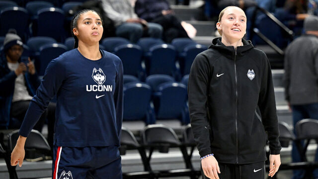 WASHINGTON, DC - JANUARY 11: Azzi Fudd #35 and Paige Bueckers #5 of the UConn Huskies warm up before the game against the Georgetown Hoyas at Entertainment & Sports Arena on January 11, 2025 in Washington, DC.