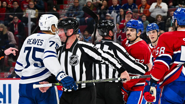 MONTREAL, CANADA - JANUARY 18: Arber Xhekaj #72 of the Montreal Canadiens has a few words for Ryan Reaves #75 of the Toronto Maple Leafs during the first period at the Bell Centre on January 18, 2025 in Montreal, Quebec, Canada.