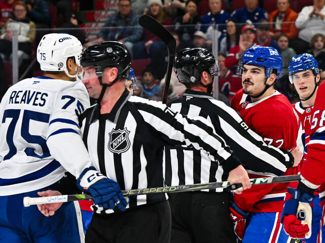 MONTREAL, CANADA - JANUARY 18: Arber Xhekaj #72 of the Montreal Canadiens has a few words for Ryan Reaves #75 of the Toronto Maple Leafs during the first period at the Bell Centre on January 18, 2025 in Montreal, Quebec, Canada.