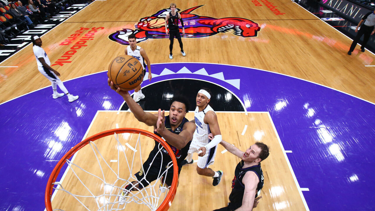 TORONTO, CANADA - JANUARY 21: Scottie Barnes #4 of the Toronto Raptors drives to the basket during the game against the Orlando Magic on January 21, 2025 at the Scotiabank Arena in Toronto, Ontario, Canada. Mandatory Copyright Notice: Copyright 2025 NBAE