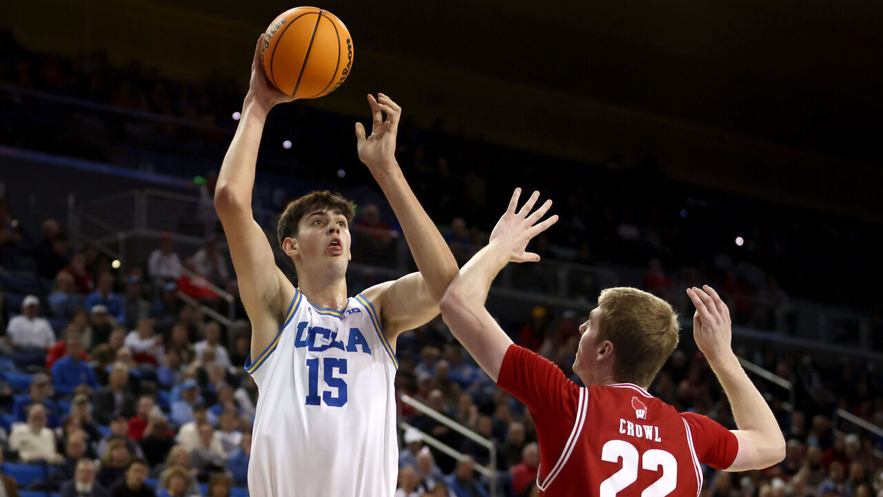 LOS ANGELES, CALIFORNIA - JANUARY 21: Aday Mara #15 of the UCLA Bruins shoots against Steven Crowl #22 of the Wisconsin Badgers during the second half at UCLA Pauley Pavilion on January 21, 2025 in Los Angeles, California.