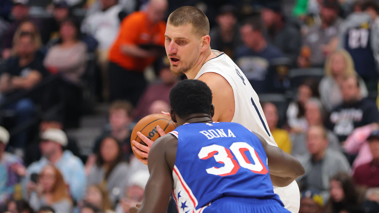 DENVER, COLORADO - JANUARY 21: Nikola Jokic #15 of the Denver Nuggets handles the ball against the Philadelphia 76ers during the third quarter at Ball Arena on January 21, 2025 in Denver, Colorado.