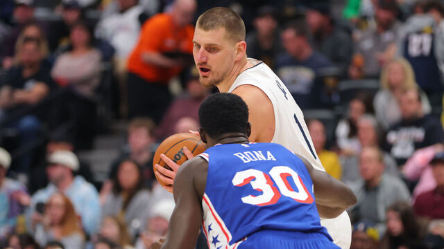 DENVER, COLORADO - JANUARY 21: Nikola Jokic #15 of the Denver Nuggets handles the ball against the Philadelphia 76ers during the third quarter at Ball Arena on January 21, 2025 in Denver, Colorado.