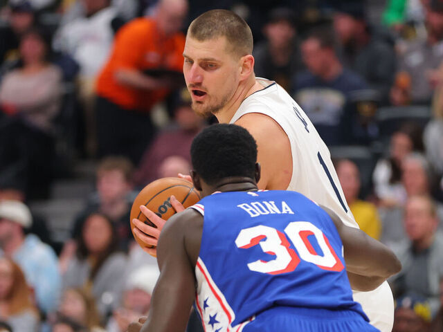 DENVER, COLORADO - JANUARY 21: Nikola Jokic #15 of the Denver Nuggets handles the ball against the Philadelphia 76ers during the third quarter at Ball Arena on January 21, 2025 in Denver, Colorado.