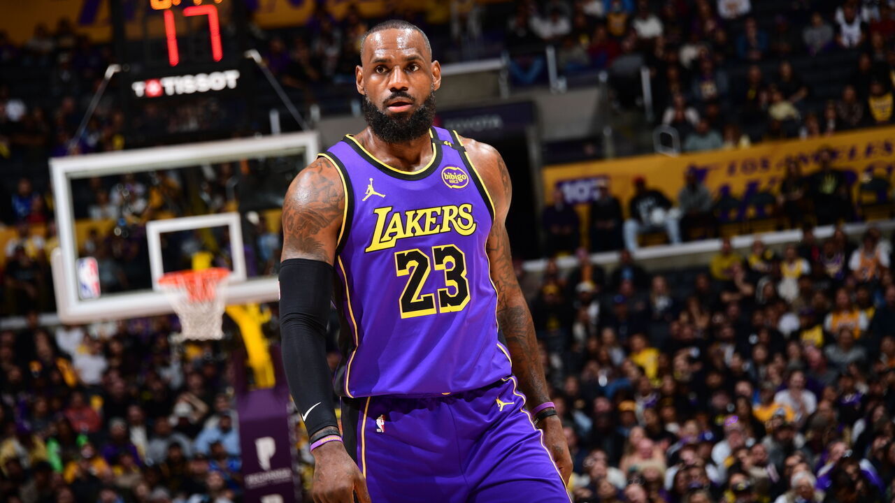 LOS ANGELES, CA - JANUARY 21: LeBron James #23 of the Los Angeles Lakers looks on during the game against the Washington Wizards on January 21, 2025 at Crypto.Com Arena in Los Angeles, California. NOTE TO USER: User expressly acknowledges and agrees that, by downloading and/or using this Photograph, user is consenting to the terms and conditions of the Getty Images License Agreement. Mandatory Copyright Notice: Copyright 2025 NBAE