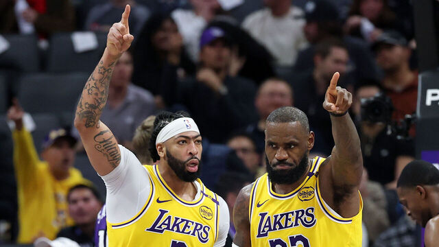 SACRAMENTO, CALIFORNIA - DECEMBER 19: Anthony Davis #3 and LeBron James #23 of the Los Angeles Lakers point down court after a turnover in their game against the Sacramento Kings in the second half at Golden 1 Center on December 19, 2024 in Sacramento, California. NOTE TO USER: User expressly acknowledges and agrees that, by downloading and/or using this photograph, user is consenting to the terms and conditions of the Getty Images License Agreement.