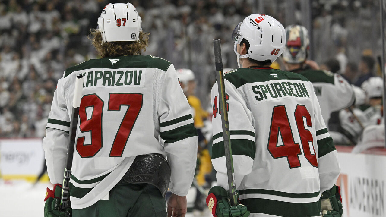 ST. PAUL, MN - NOVEMBER 30: Minnesota Wild forward Kirill Kaprizov (97) and Minnesota Wild defenseman Jared Spurgeon (46) take a breather during an NHL game between the Minnesota Wild and Nashville Predators on November 30, 2024, at Xcel Energy Center in St. Paul, MN.