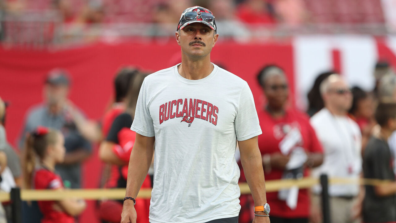 TAMPA, FL - AUGUST 13: Tampa Bay Buccaneers Vice President of Player Personnel John Spytek watches the action on the field before the preseason game between the Miami Dolphins and the Tampa Bay Buccaneers on August 13, 2022 at Raymond James Stadium in Tampa, Florida.