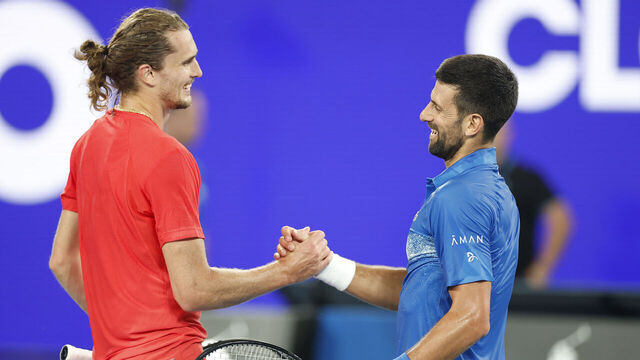 MELBOURNE, AUSTRALIA - JANUARY 09: Alexander Zverev of Germany and Novak Djokovic of Serbia embrace at the net after their exhibition match during the Night with Novak charity event ahead of the 2025 Australian Open at Melbourne Park on January 09, 2025 in Melbourne, Australia.