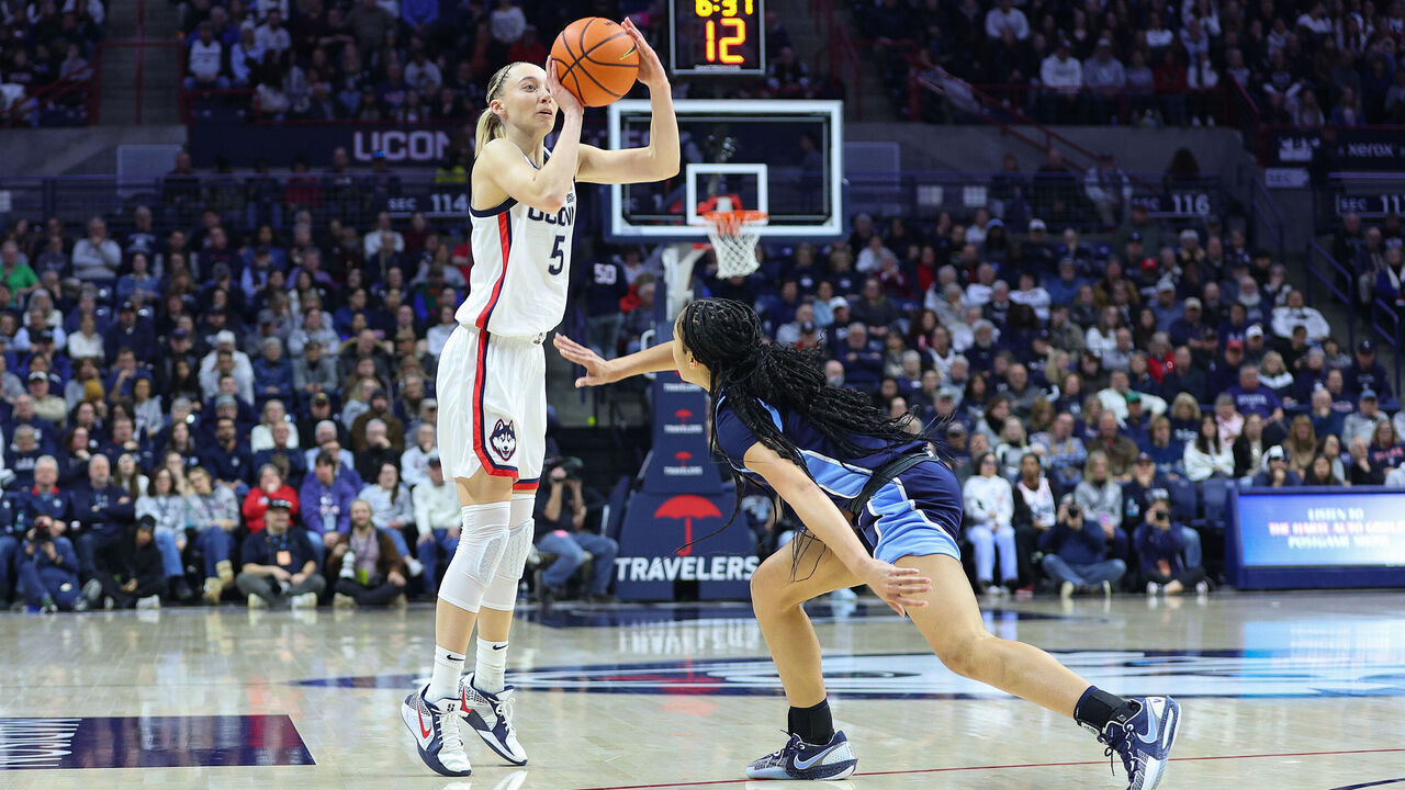 STORRS, CT - JANUARY 22: UConn Huskies guard Paige Bueckers (5) shoots a three point shot during the women's college basketball game between Villanova Wildcats and UConn Huskies on January 22, 2025, at Harry A. Gampel Pavilion in Storrs, CT.