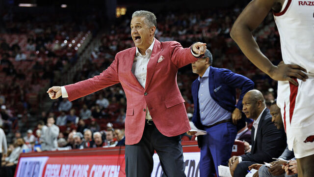FAYETTEVILLE, ARKANSAS - JANUARY 22: Head coach John Calipari of the Arkansas Razorbacks yells to his team in the first half during action against the Georgia Bulldogs at Bud Walton Arena on January 22, 2025 in Fayetteville, Arkansas.