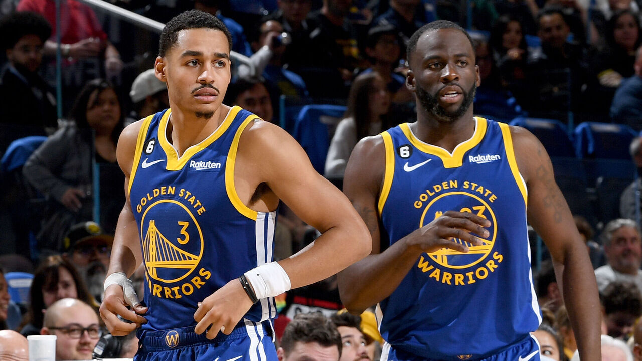 SAN FRANCISCO, CA - January 7: Jordan Poole #3 and Draymond Green #23 of the Golden State Warriors looks on during the game against the Orlando Magic on JANUARY 7, 2023 at Chase Center in San Francisco, California. NOTE TO USER: User expressly acknowledges and agrees that, by downloading and or using this photograph, user is consenting to the terms and conditions of Getty Images License Agreement. Mandatory Copyright Notice: Copyright 2022 NBAE