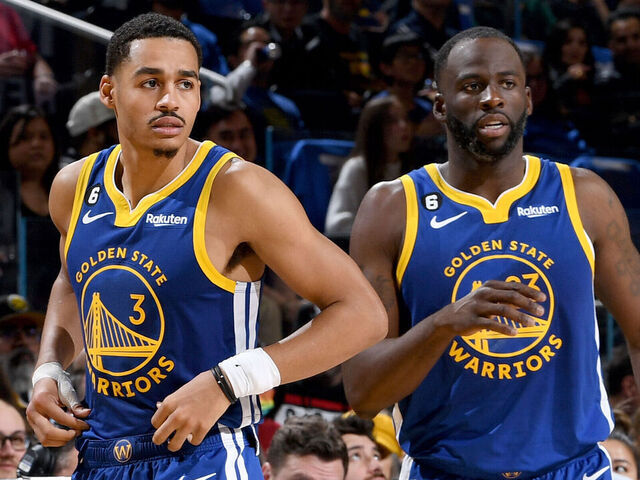 SAN FRANCISCO, CA - January 7: Jordan Poole #3 and Draymond Green #23 of the Golden State Warriors looks on during the game against the Orlando Magic on JANUARY 7, 2023 at Chase Center in San Francisco, California. NOTE TO USER: User expressly acknowledges and agrees that, by downloading and or using this photograph, user is consenting to the terms and conditions of Getty Images License Agreement. Mandatory Copyright Notice: Copyright 2022 NBAE