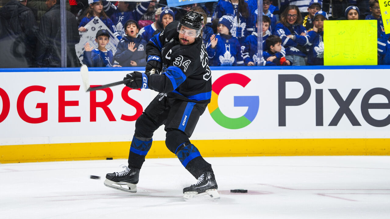 TORONTO, ON - JANUARY 22: Fans watch as Auston Matthews #34 warms up before facing the Columbus Blue Jackets at the Scotiabank Arena on January 22, 2025 in Toronto, Ontario, Canada.