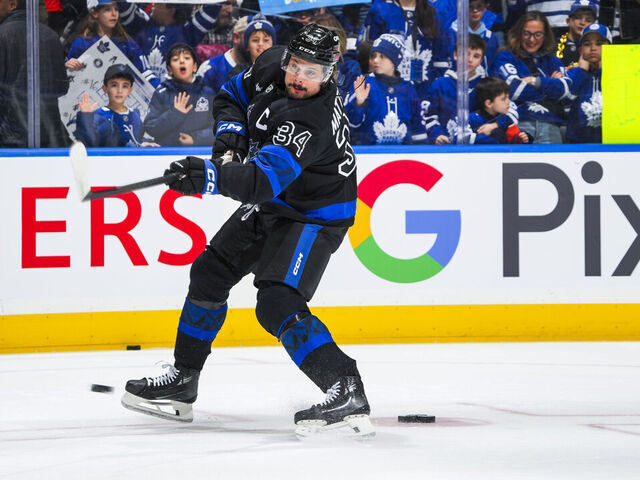 TORONTO, ON - JANUARY 22: Fans watch as Auston Matthews #34 warms up before facing the Columbus Blue Jackets at the Scotiabank Arena on January 22, 2025 in Toronto, Ontario, Canada.