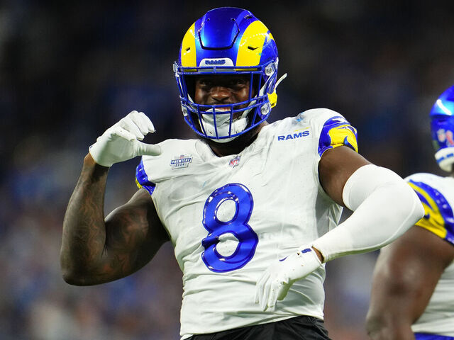DETROIT, MI - SEPTEMBER 08: Jared Verse #8 of the Los Angeles Rams celebrates after a play against the Detroit Lions during the first half of an football game at Ford Field on September 8, 2024 in Detroit, Michigan.