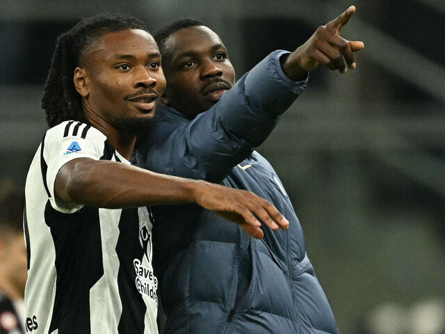 Juventus' French midfielder #19 Khephren Thuram-Ulien (L) and his brother Inter Milan's French forward #09 Marcus Thuram are pictured at the end of the Italian Serie A football match between Inter Milan and Juventus at San Siro stadium in Milan, on October 27, 2024.