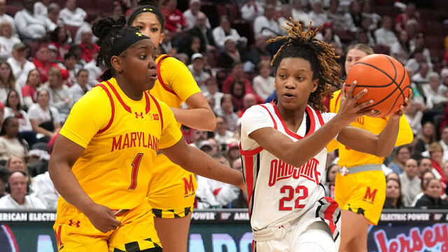 COLUMBUS, OH - JANUARY 23: Ohio State Buckeyes guard Jaloni Cambridge (22) drives to the basket against Maryland Terrapins guard Sarah Te-Biasu (1) during the game between the Ohio State Buckeyes and the Maryland Terrapins at Value City Arena in Columbus, Ohio on January 23, 2025.
