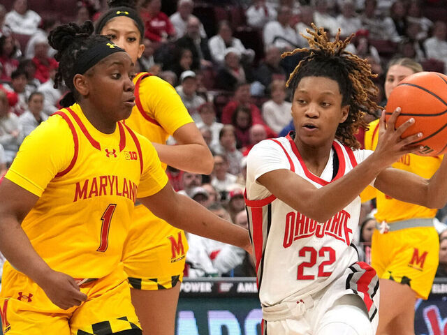 COLUMBUS, OH - JANUARY 23: Ohio State Buckeyes guard Jaloni Cambridge (22) drives to the basket against Maryland Terrapins guard Sarah Te-Biasu (1) during the game between the Ohio State Buckeyes and the Maryland Terrapins at Value City Arena in Columbus, Ohio on January 23, 2025.