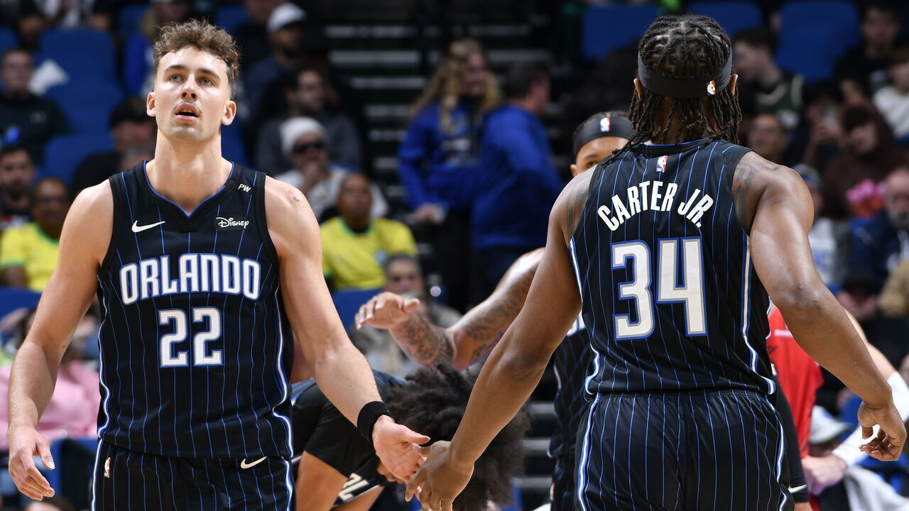 ORLANDO, FL - JANUARY 23: Franz Wagner #22 and Wendell Carter Jr. #34 of the Orlando Magic high five during the game against the Portland Trail Blazers on January 23, 2025 at Kia Center in Orlando, Florida. Mandatory Copyright Notice: Copyright 2025 NBAE