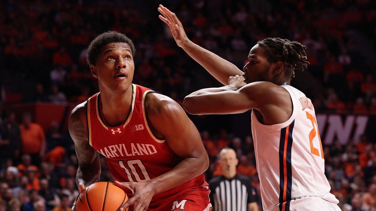 CHAMPAIGN, ILLINOIS - JANUARY 23: Julian Reese #10 of the Maryland Terrapins goes up for a layup against Morez Johnson Jr. #21 of the Illinois Fighting Illini during the second half at State Farm Center on January 23, 2025 in Champaign, Illinois.