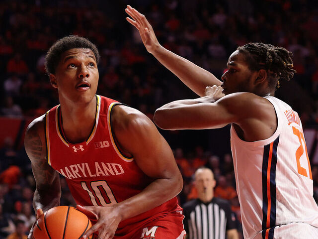 CHAMPAIGN, ILLINOIS - JANUARY 23: Julian Reese #10 of the Maryland Terrapins goes up for a layup against Morez Johnson Jr. #21 of the Illinois Fighting Illini during the second half at State Farm Center on January 23, 2025 in Champaign, Illinois.