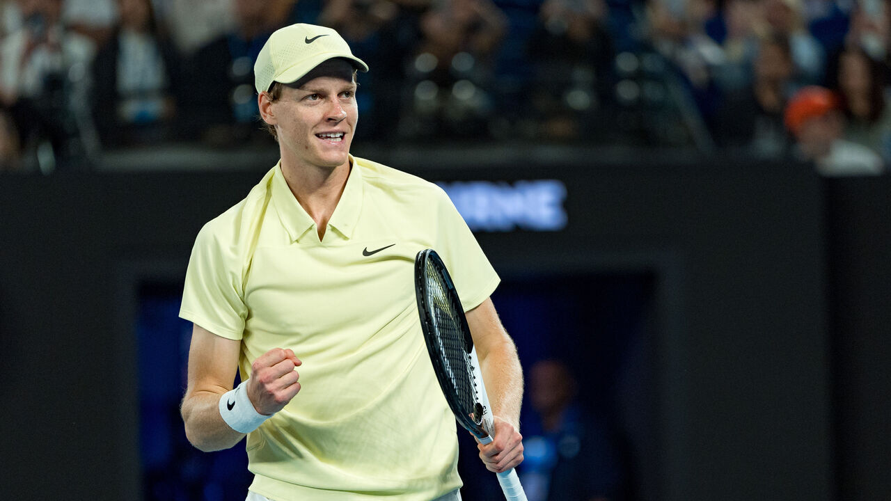 MELBOURNE, AUSTRALIA - JANUARY 24: Jannik Sinner of Italy celebrates winning match point against Ben Shelton of the United States in the Men's Singles Semifinal match during day 13 of the 2025 Australian Open at Melbourne Park on January 24, 2025 in Melbourne, Australia.