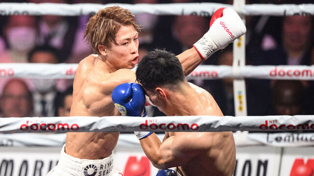 Japan's Naoya Inoue (L) fights against South Korea's Kim Ye-joon during their world super-bantamweight title boxing bout in Tokyo on January 24, 2025.