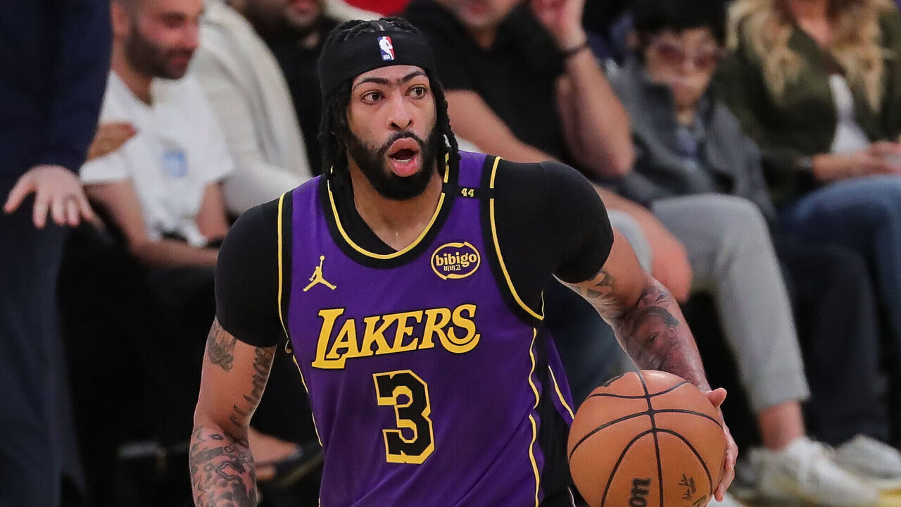 LOS ANGELES, CA - JANUARY 21: Los Angeles Lakers forward Anthony Davis (3) dribbles during the Washington Wizards vs Los Angeles Lakers game on January 21, 2025, at Crypto.com Arena in Los Angeles, CA.