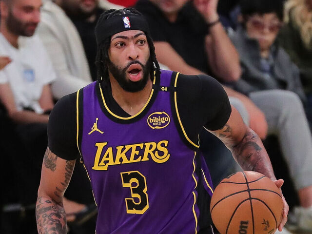LOS ANGELES, CA - JANUARY 21: Los Angeles Lakers forward Anthony Davis (3) dribbles during the Washington Wizards vs Los Angeles Lakers game on January 21, 2025, at Crypto.com Arena in Los Angeles, CA.