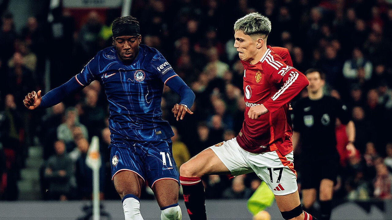 MANCHESTER, ENGLAND - NOVEMBER 03: Alejandro Garnacho of Manchester United in action with Noni Madueke of Chelsea during the Premier League match between Manchester United FC and Chelsea FC at Old Trafford on November 03, 2024 in Manchester, England.