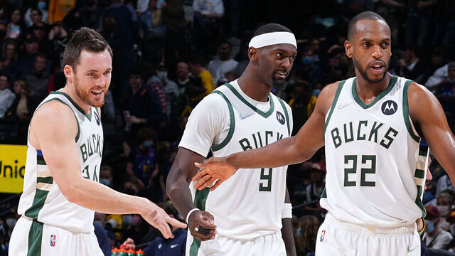 DENVER, CO - NOVEMBER 26: Pat Connaughton #24 of the Milwaukee Bucks, Bobby Portis #9 of the Milwaukee Bucks, and Khris Middleton #22 of the Milwaukee Bucks smile after a game against the Denver Nuggets on November 26, 2021 at the Ball Arena in Denver, Colorado. NOTE TO USER: User expressly acknowledges and agrees that, by downloading and/or using this Photograph, user is consenting to the terms and conditions of the Getty Images License Agreement. Mandatory Copyright Notice: Copyright 2021 NBAE