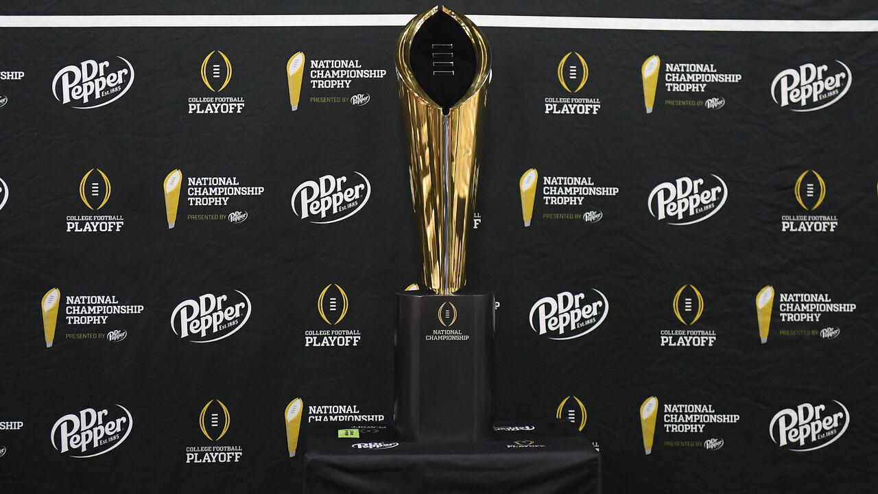 ATLANTA, GEORGIA - JANUARY 18: A detailed view of the CFP National Championship Trophy during media day at the Georgia World Congress Center prior to the 2025 CFP National Championship between the Ohio State Buckeyes and Notre Dame Fighting Irish on January 18, 2025 in Atlanta, Georgia.