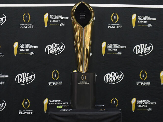ATLANTA, GEORGIA - JANUARY 18: A detailed view of the CFP National Championship Trophy during media day at the Georgia World Congress Center prior to the 2025 CFP National Championship between the Ohio State Buckeyes and Notre Dame Fighting Irish on January 18, 2025 in Atlanta, Georgia.