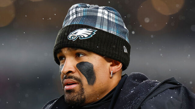 PHILADELPHIA, PENNSYLVANIA - JANUARY 19: Jalen Hurts #1 of the Philadelphia Eagles on the sideline during the first half of the NFC Divisional Playoff game against the Los Angeles Rams at Lincoln Financial Field on January 19, 2025 in Philadelphia, Pennsylvania.