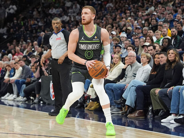 MINNEAPOLIS, MN - JANUARY 15: Donte DiVincenzo #0 of the Minnesota Timberwolves shoots a three point basket during the game against the Golden State Warriors on January 15, 2025 at Target Center in Minneapolis, Minnesota. Mandatory Copyright Notice: Copyright 2025 NBAE