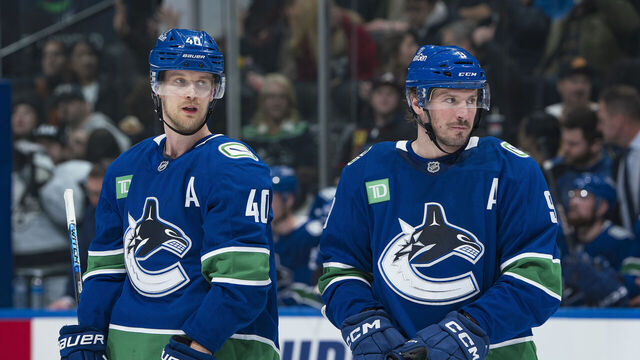 VANCOUVER, CANADA - JANUARY 16: Elias Pettersson #40 and J.T. Miller #9 of the Vancouver Canucks skate up ice during their NHL game against the Los Angeles Kings at Rogers Arena on January 16, 2025 in Vancouver, British Columbia, Canada.