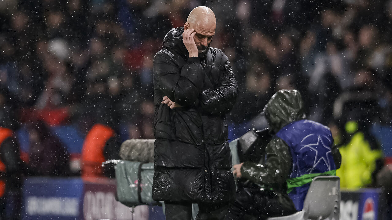 PARIS, FRANCE - JANUARY 22: Manchester City Head Coach Pep Guardiola reacts as City is beaten by PSG during the UEFA Champions League 2024/25 League Phase MD7 match between Paris Saint-Germain and Manchester City at Parc des Princes on January 22, 2025 in Paris, France.